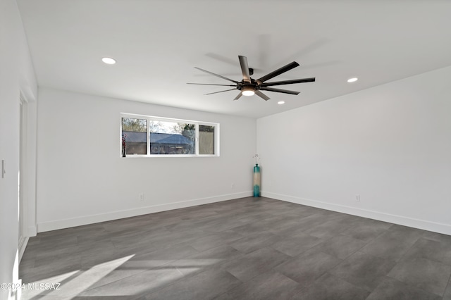 spare room with ceiling fan