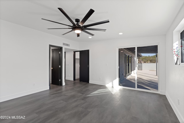 unfurnished room with ceiling fan