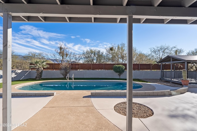 view of pool featuring a patio and a gazebo