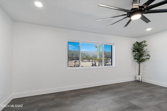 spare room featuring ceiling fan