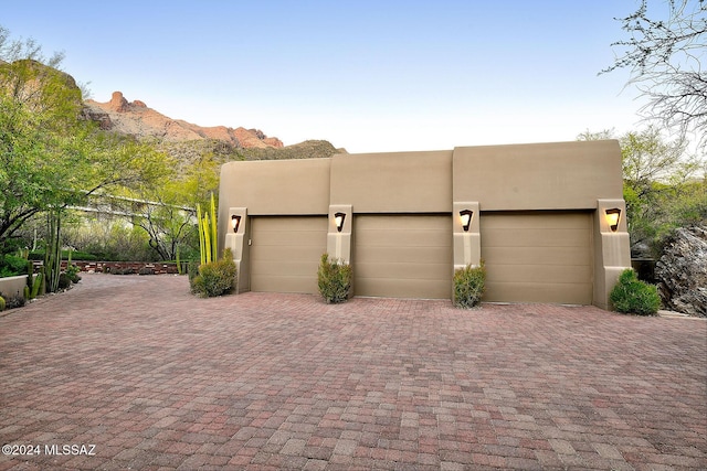 garage featuring a mountain view