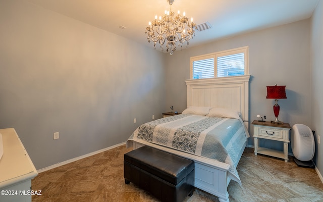 tiled bedroom featuring a notable chandelier