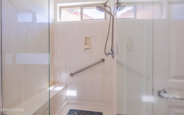 walk in closet with wood-type flooring