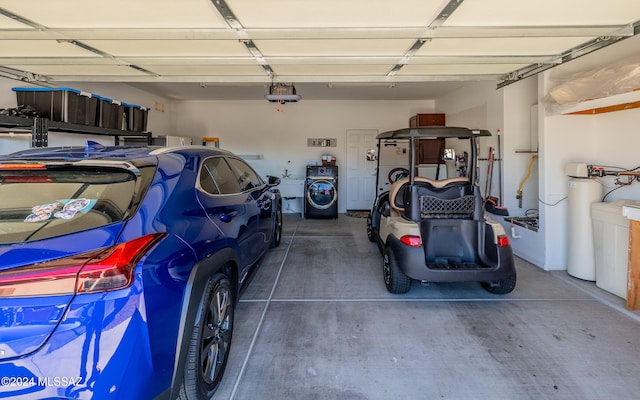 garage featuring washer / dryer and sink