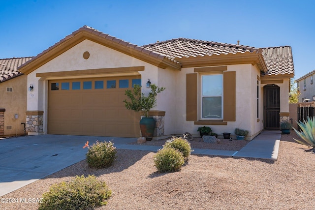 view of front of home with a garage