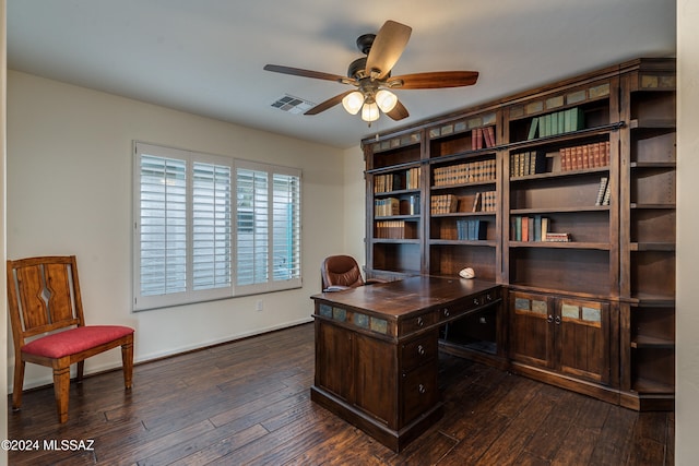 office area with dark wood-type flooring and ceiling fan