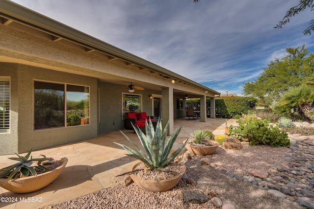 view of patio with ceiling fan