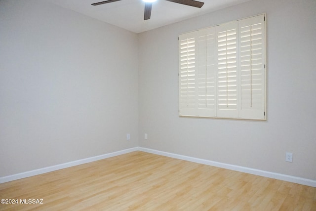 unfurnished room featuring ceiling fan and light wood-type flooring