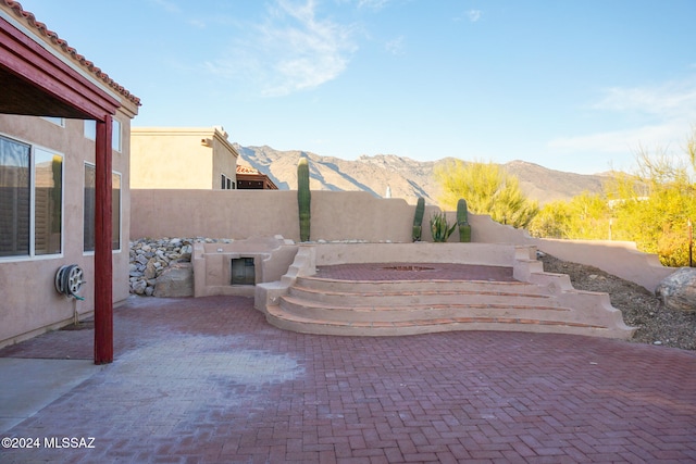 view of patio / terrace with a mountain view