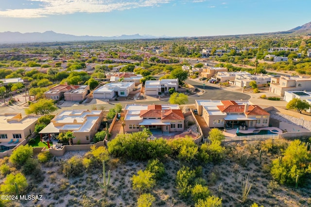 bird's eye view with a residential view and a mountain view