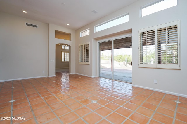 foyer entrance featuring baseboards, recessed lighting, visible vents, and tile patterned floors