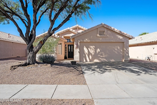 view of front of home featuring a garage