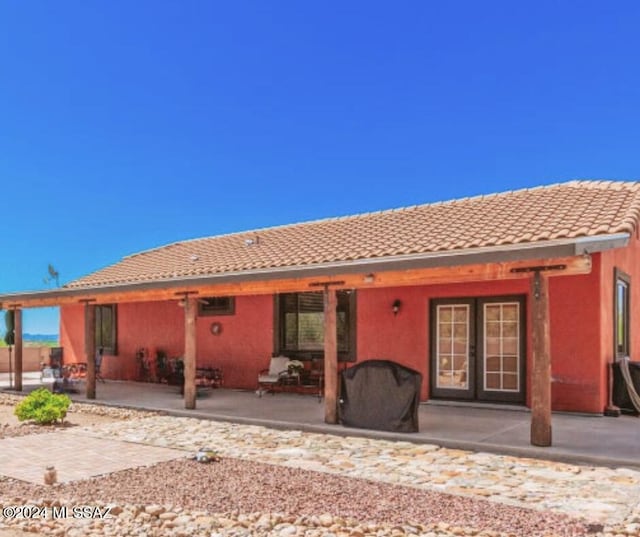 rear view of house with a patio area