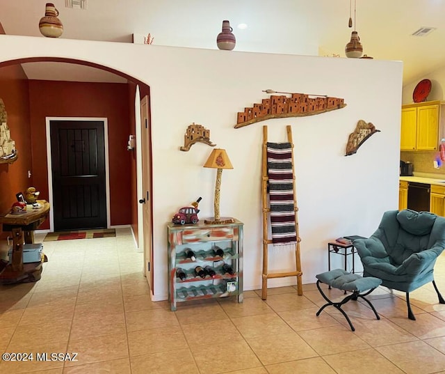 sitting room featuring light tile patterned floors