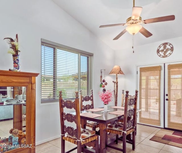 dining area with ceiling fan, light tile patterned flooring, and a healthy amount of sunlight