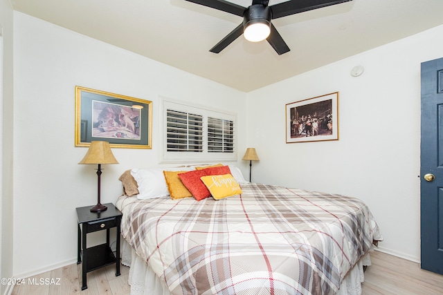 bedroom featuring ceiling fan and light wood-type flooring