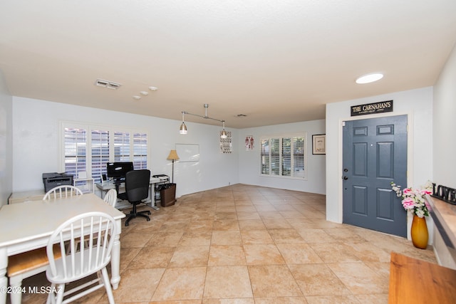 office with light tile patterned floors