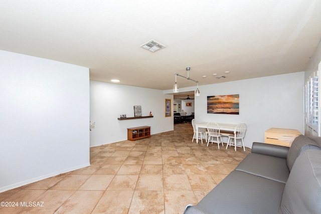 living room featuring ceiling fan