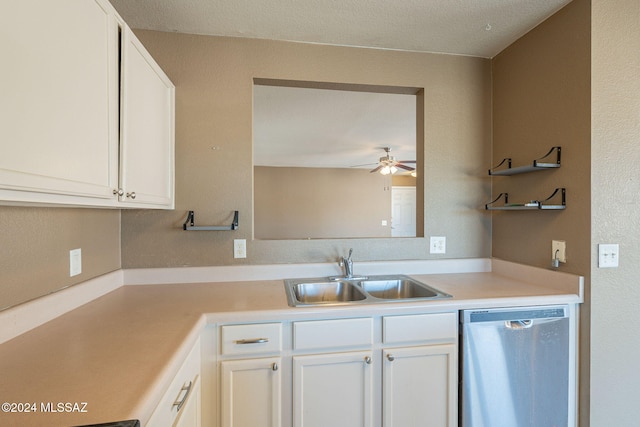 kitchen featuring white cabinetry, sink, ceiling fan, and stainless steel dishwasher