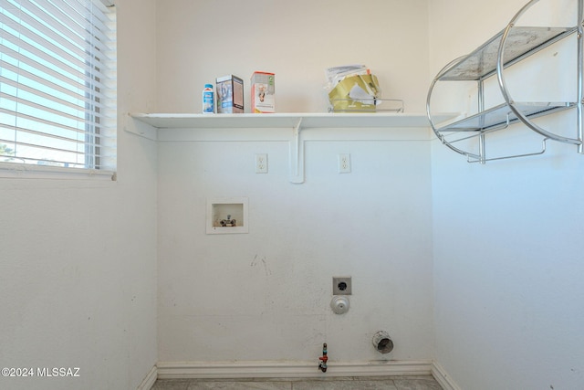 laundry room with electric dryer hookup, gas dryer hookup, and washer hookup