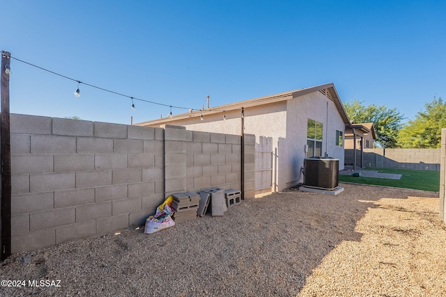 exterior space featuring central air condition unit