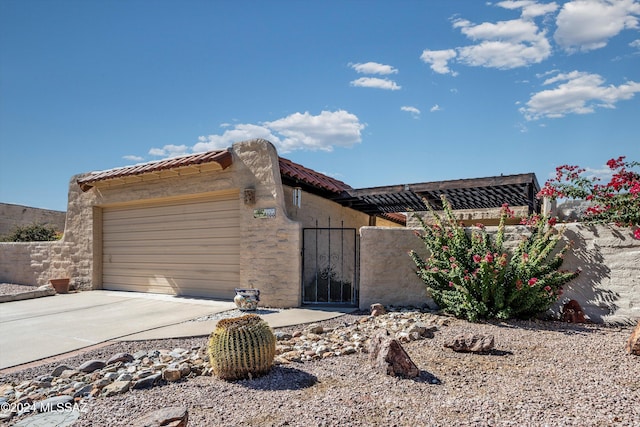 view of side of property with a garage