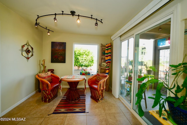 living area featuring light tile patterned floors