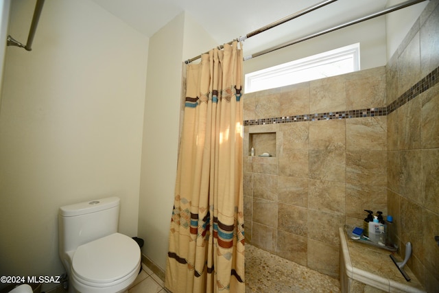 bathroom with walk in shower and toilet