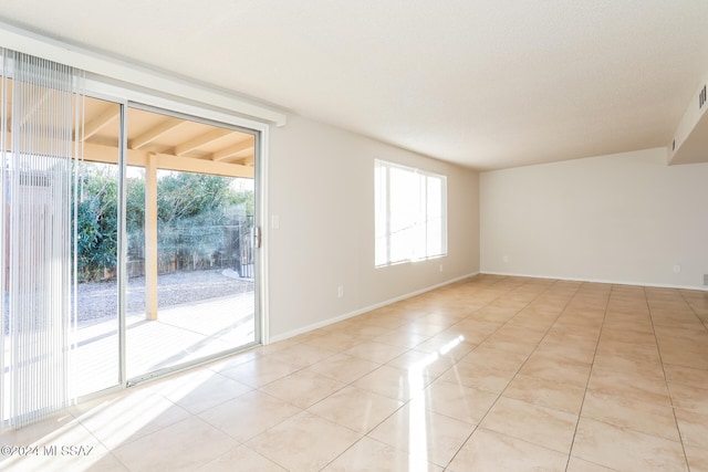 view of tiled spare room