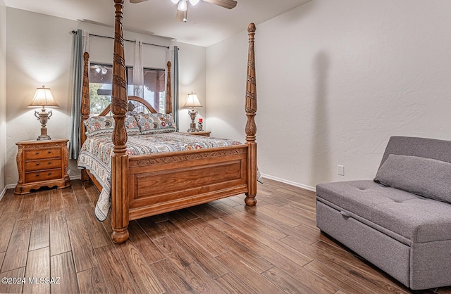 bedroom featuring wood-type flooring and ceiling fan