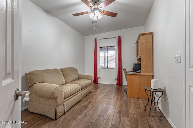 interior space featuring dark wood-type flooring and ceiling fan