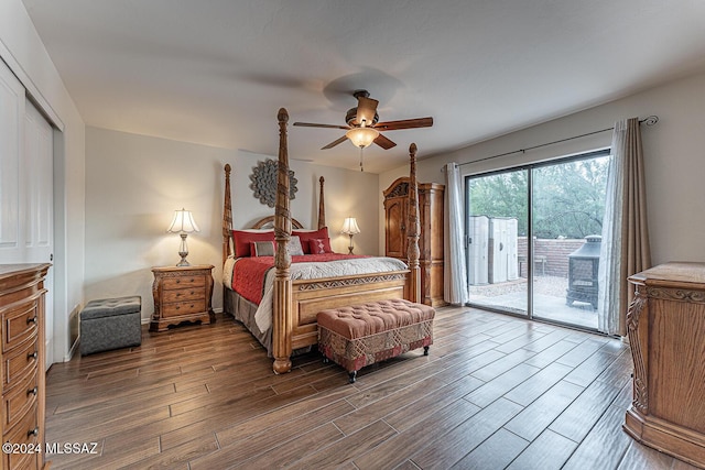 bedroom with wood-type flooring, access to exterior, ceiling fan, and a closet