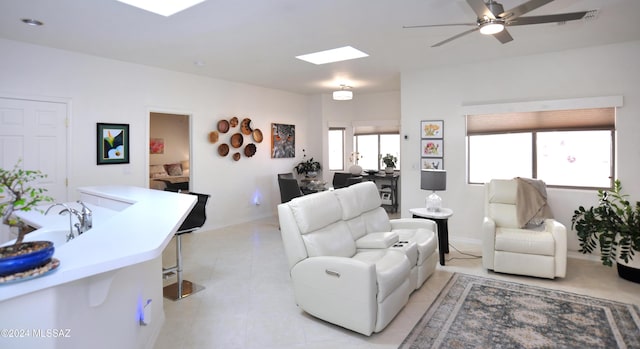 living room with ceiling fan