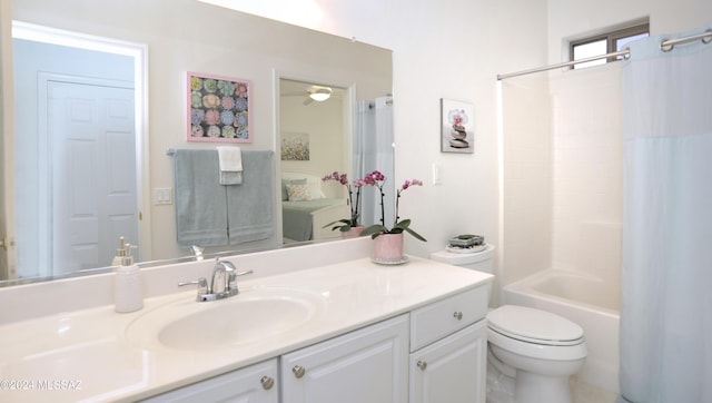 full bathroom featuring vanity, shower / bath combo, and toilet