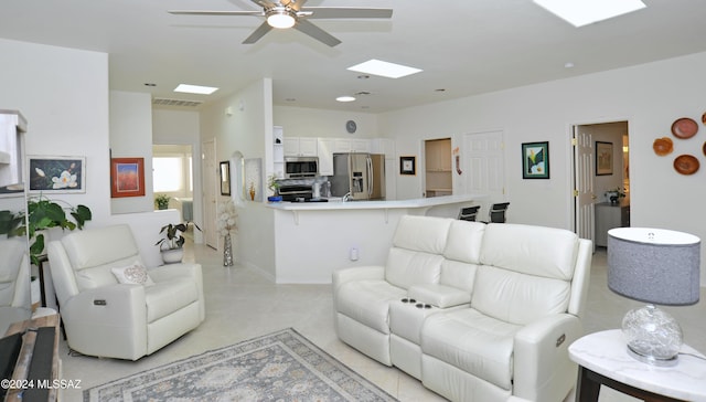 living room featuring ceiling fan