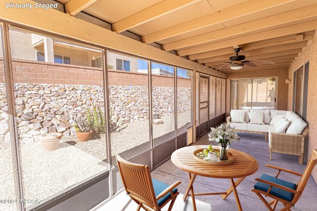 287 N Via Ln, Castellana, Green Valley, AZ 85614 - sunroom with a ceiling fan, beamed ceiling, and an outdoor living space