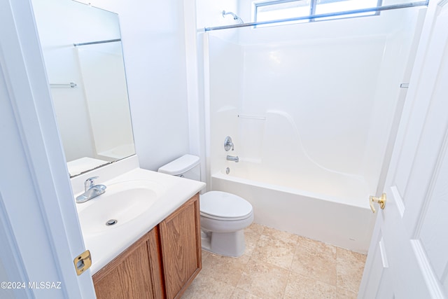 full bathroom with toilet, vanity, and bathing tub / shower combination