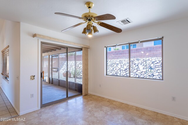 unfurnished room featuring ceiling fan