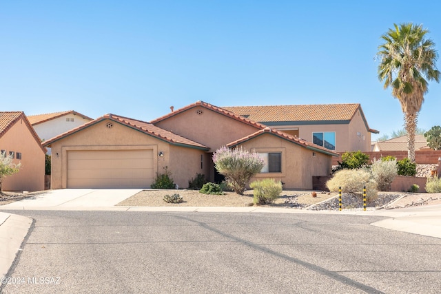 view of front of property featuring a garage