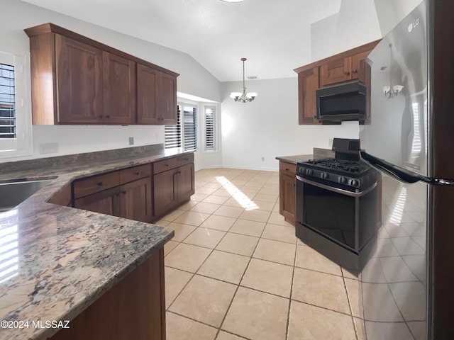 kitchen with light tile patterned flooring, black appliances, an inviting chandelier, lofted ceiling, and pendant lighting