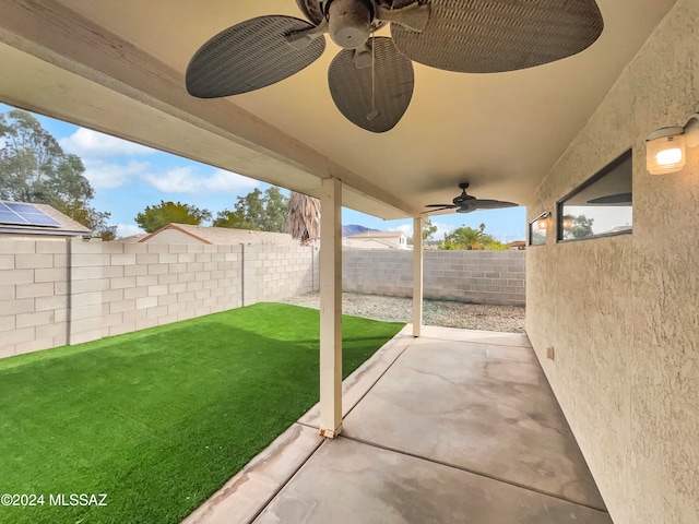 view of patio / terrace featuring ceiling fan