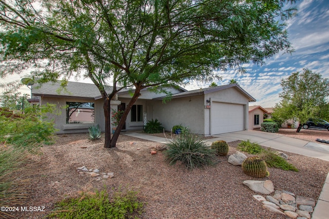 ranch-style home with a garage