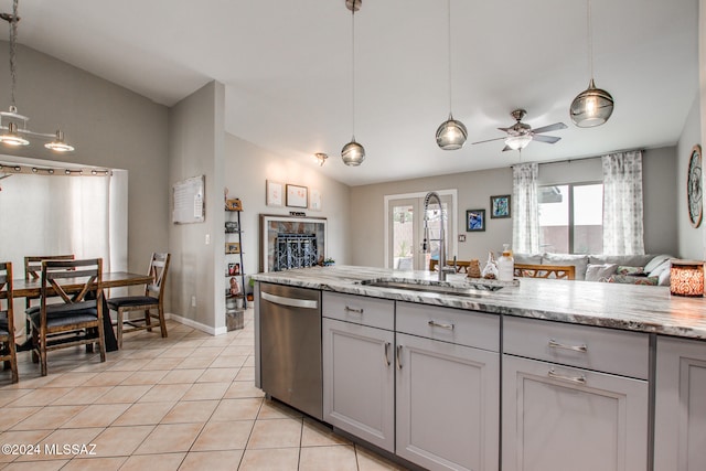 kitchen with gray cabinets, ceiling fan, dishwasher, and vaulted ceiling