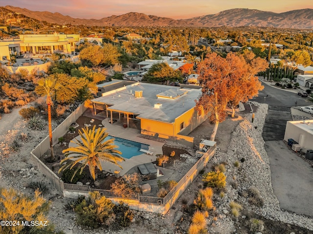 aerial view at dusk with a mountain view