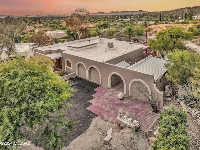 view of aerial view at dusk