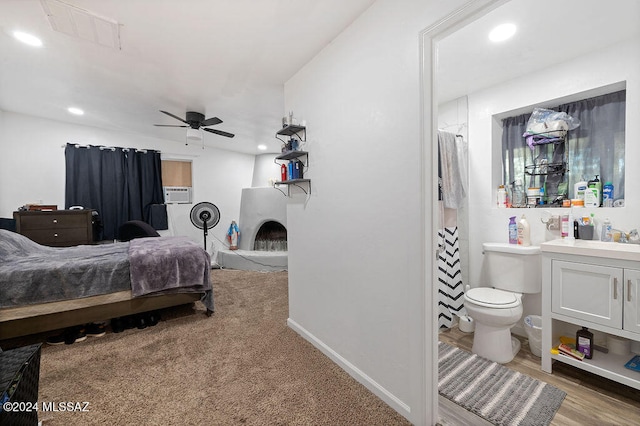 bedroom with ceiling fan and light wood-type flooring