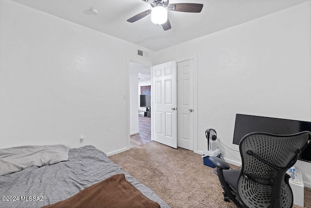 bedroom with carpet and ceiling fan