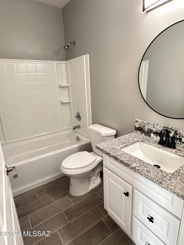 full bathroom featuring toilet, vanity, and shower / bath combination