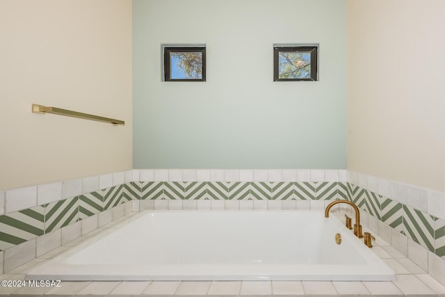 bathroom with tiled tub