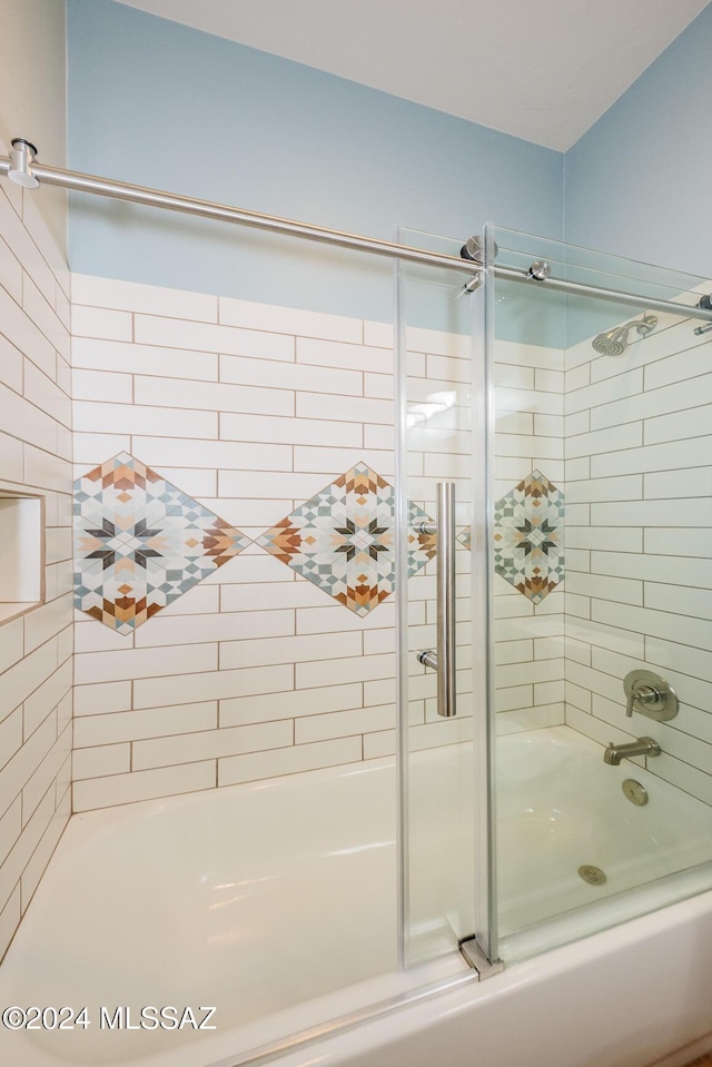 bathroom featuring tiled shower / bath combo